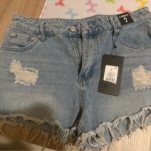 Carbon Light Blue Distressed Denim Shorts
